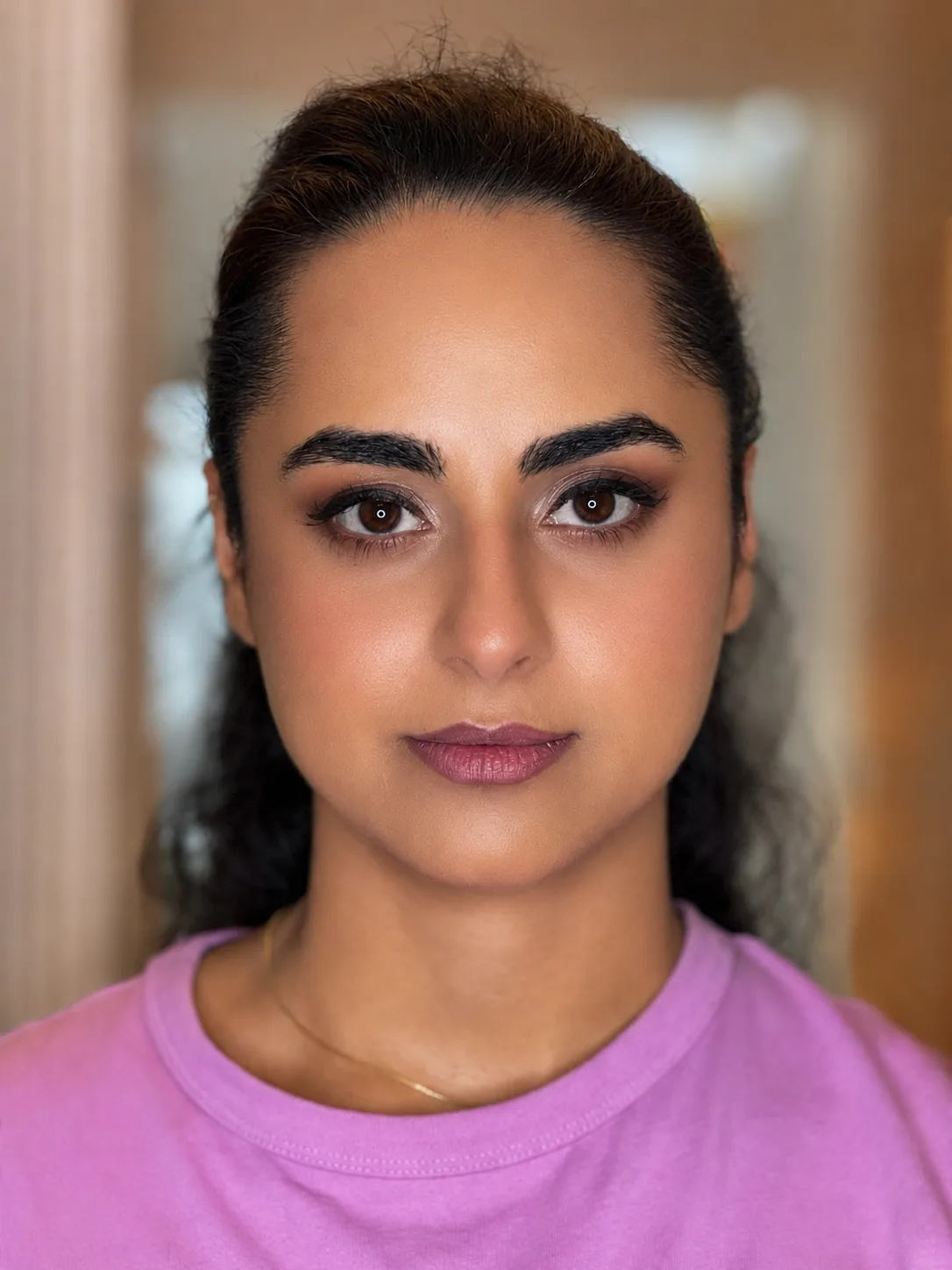 Natural bridal makeup by MZ Makeup - soft brown eye, defined brows, mauve-pink lip and pink patterned robe