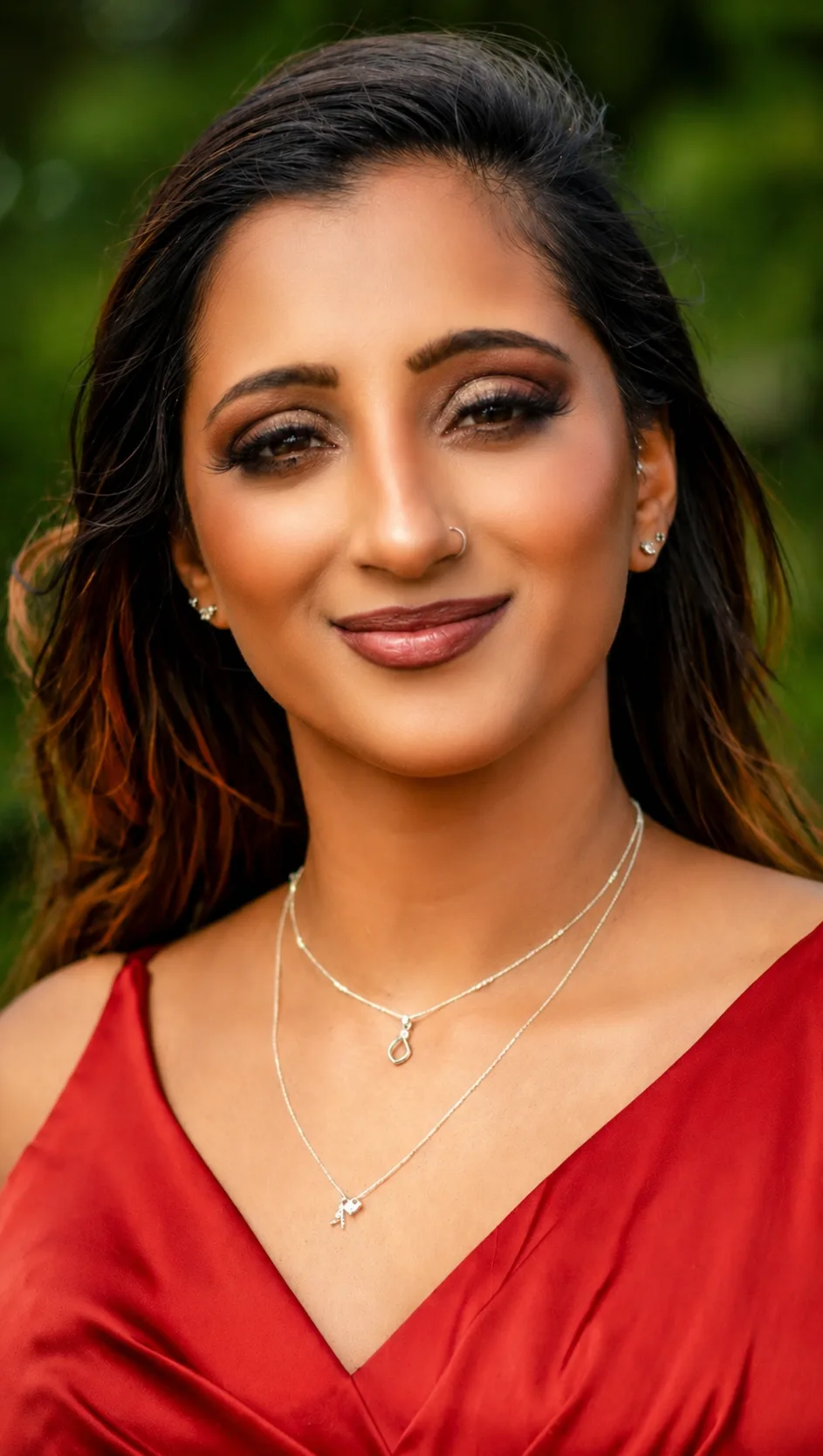 Outdoor bridal portrait - warm brown smoky eye, berry-rose lip and red satin dress by MZ Makeup