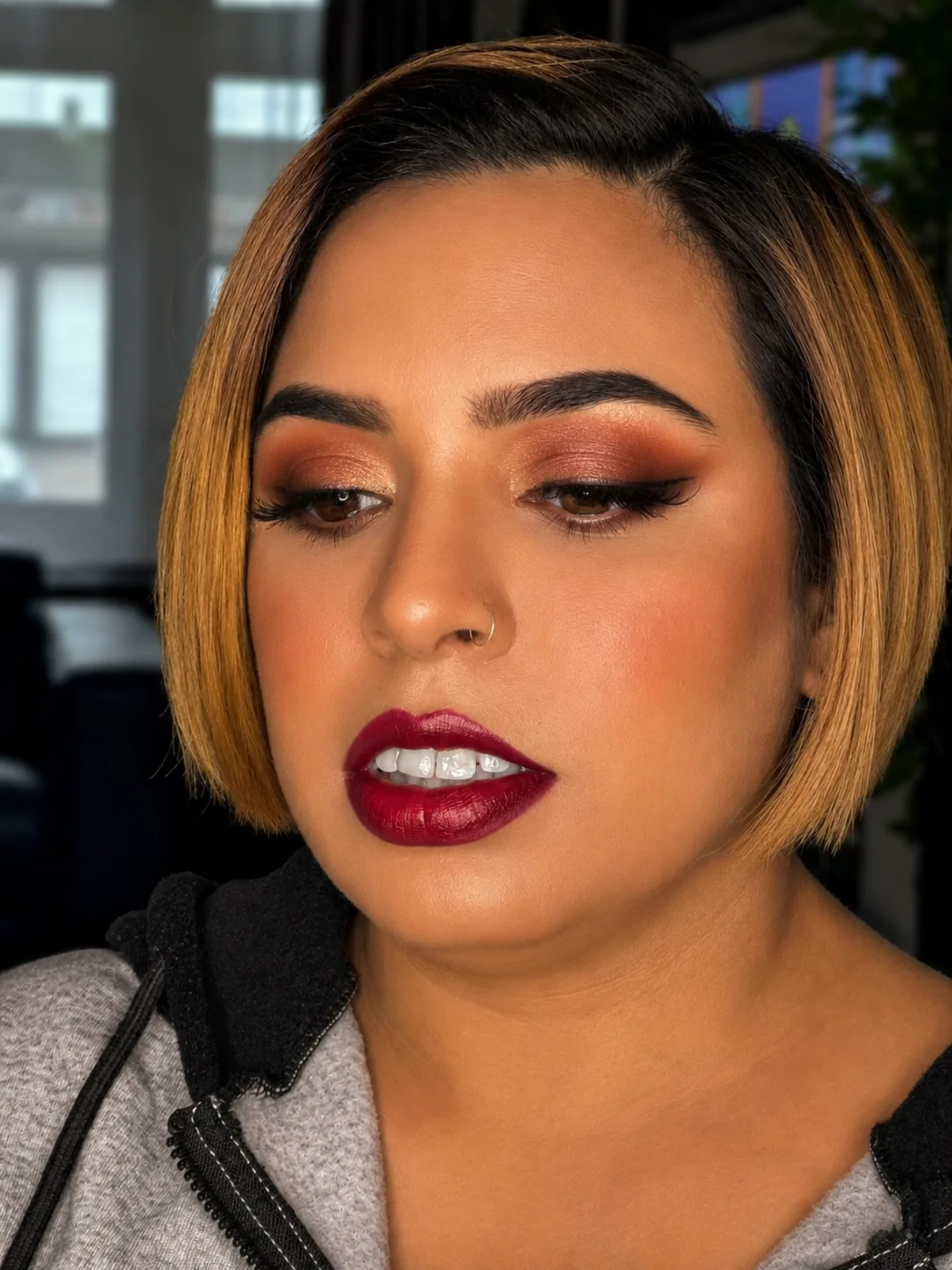Party makeup - warm copper-red smoky eye and dark cherry-burgundy lip by MZ Makeup Bedfordshire
