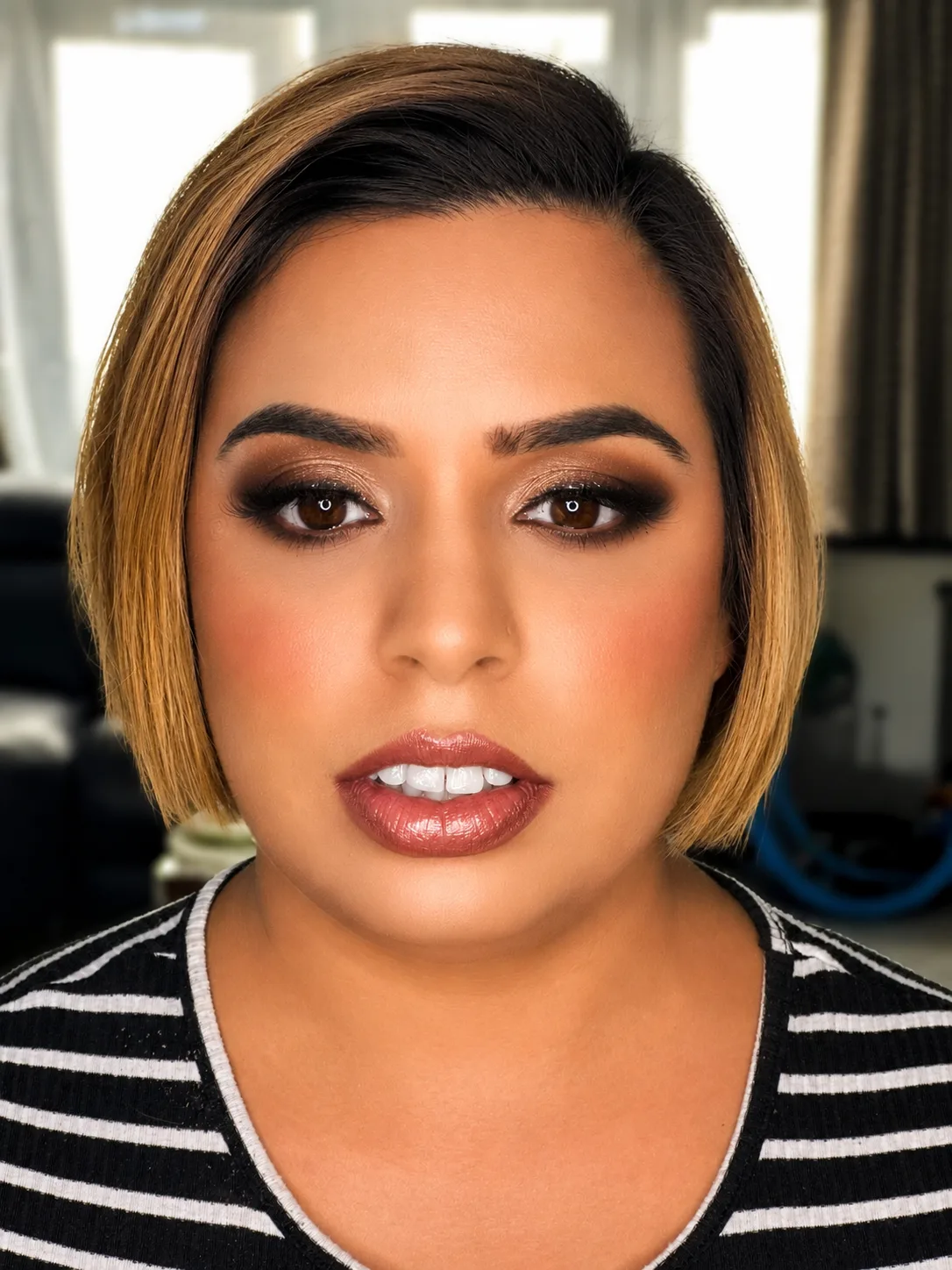 Party makeup - warm brown smoky eye and soft bronze-nude lip by MZ Makeup Bedfordshire