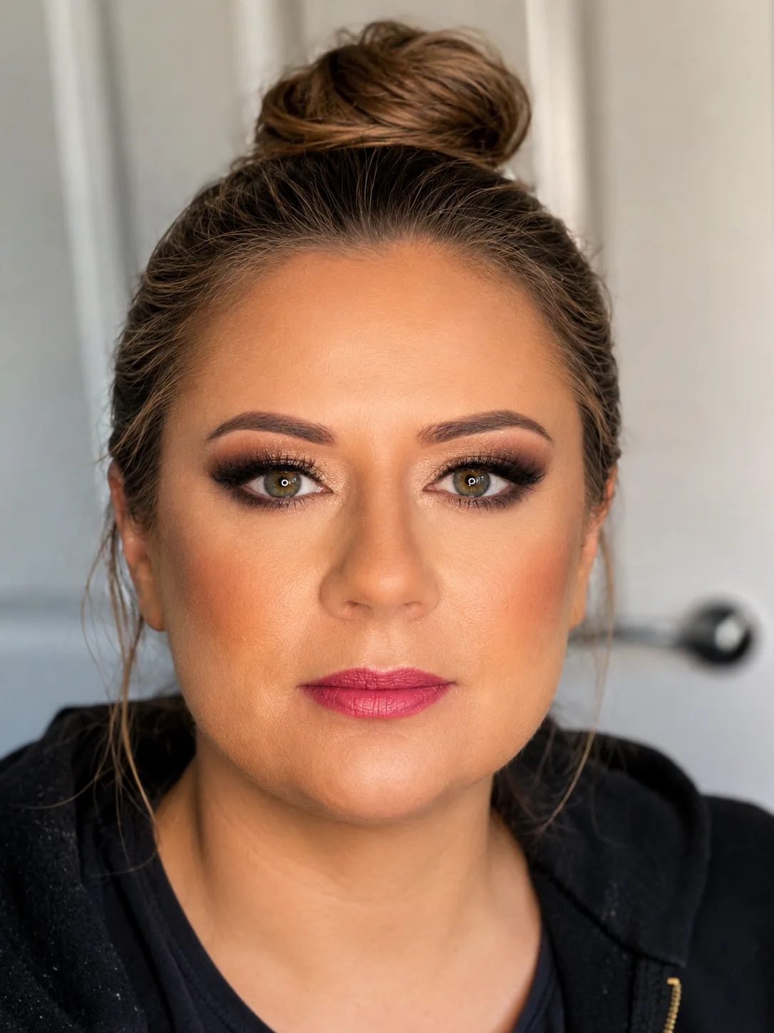 Party makeup - warm copper-brown smoky eye, pink-rose lip and top knot bun by MZ Makeup Bedfordshire