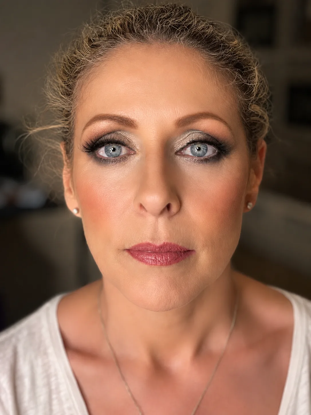 Glamorous party makeup - dramatic dark shimmer smoky eye and berry-rose lip with blonde updo by MZ Makeup