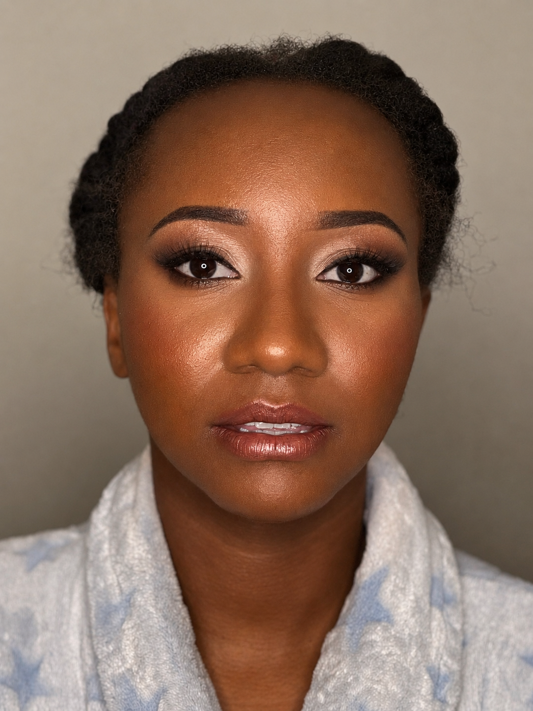 Mahnaz Syed applying party glam — MZ Makeup Artist, mobile service in Dunstable