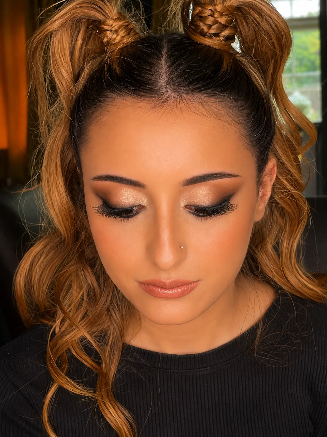 Prom makeup eyes closed - warm bronze smoky eye, nude lip and double space bun hairstyle by MZ Makeup