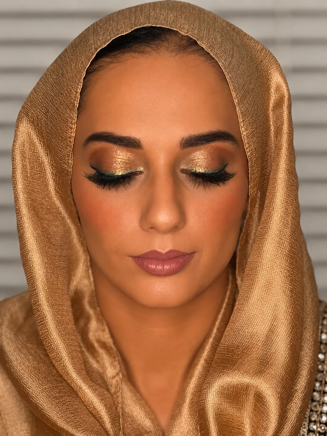 Party Makeup - MZ Makeup, Bedfordshire Party makeup for medium/tan skin - warm gold shimmer eye, defined liner and soft mauve lip with gold satin hijab by MZ Makeup Bedfordshire