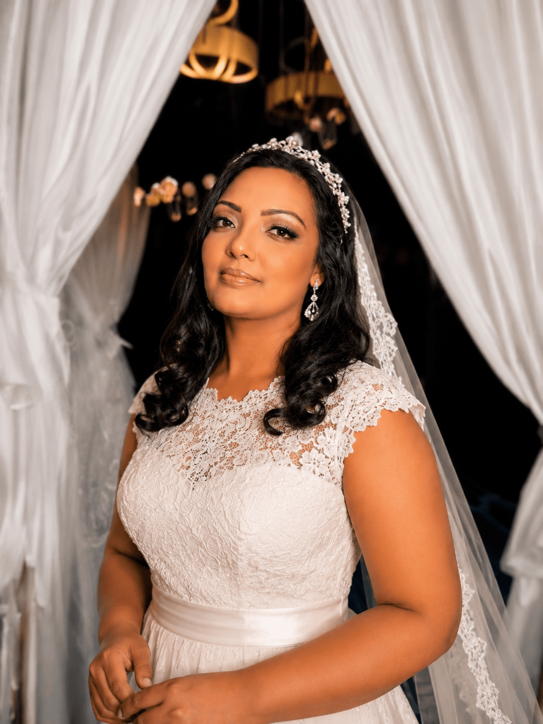 Soft Glam Bridal Makeup | MZ Makeup Hertfordshire Soft glam bridal makeup with defined eyes, radiant skin and nude-pink lip on bride wearing tiara and lace gown by MZ Makeup Hertfordshire