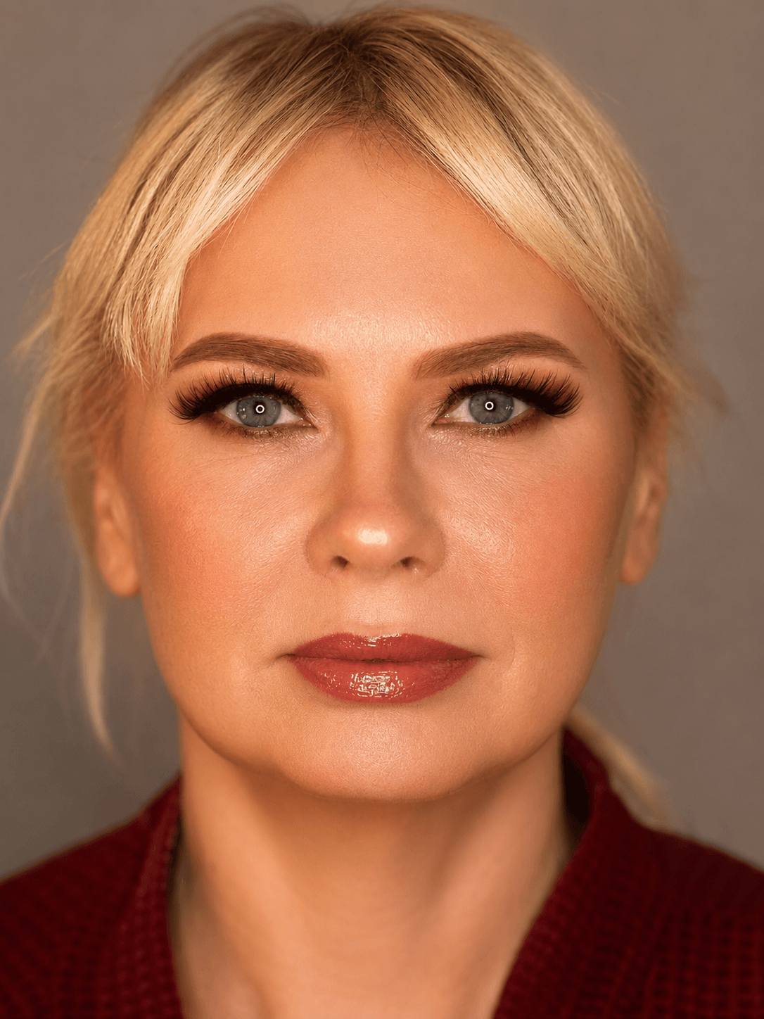 Terracotta Smoky Eye Party Makeup | MZ Makeup Bedfordshire Party makeup with warm terracotta smoky eye and glossy brick-red lip on fair skin by MZ Makeup Bedfordshire