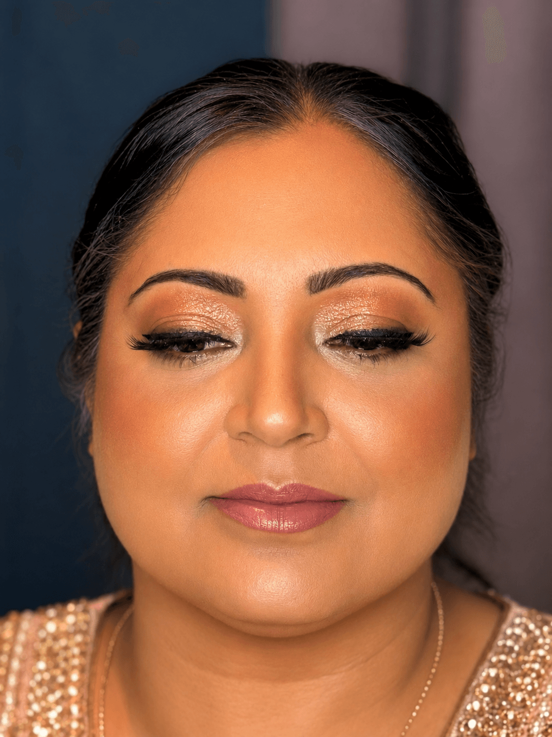 Gold Shimmer Eye Party Makeup Close Up - MZ Makeup Bedfordshire Party makeup eyes closed, medium/tan skin - warm gold shimmer eye and mauve lip by MZ Makeup