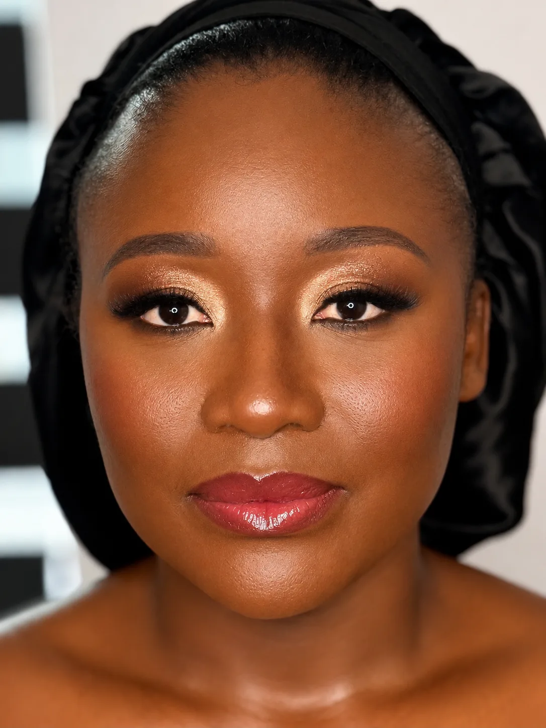 Gold Shimmer Eye and Berry Lip Party Makeup - MZ Makeup Bedfordshire Party makeup, deep/dark skin - warm gold shimmer eye and glossy berry lip with satin headscarf by MZ Makeup